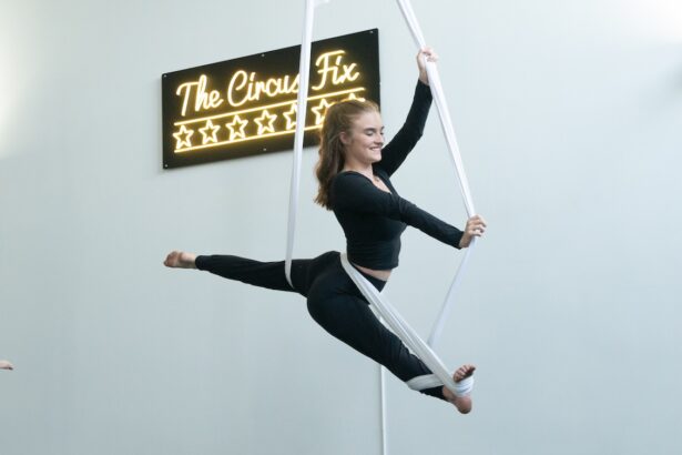 A woman in the air on aerial hammock