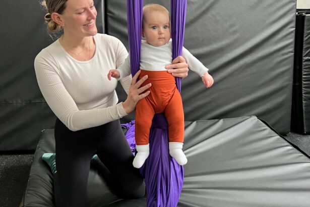 Mom with baby in aerial hammock